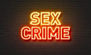 Neon sign saying Sex Crime